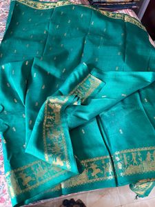 Beautiful Teal Saree with Gold Border