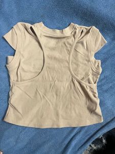 Cute Beige Sleeveless Top with Logo