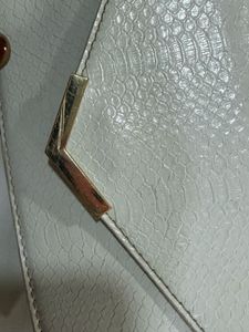 accesorize london sling bag