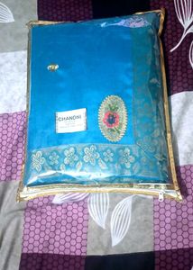 new Beautiful Teal Saree with Floral Border