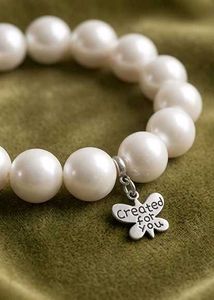 Elegant Pearl Bracelet with Butterfly Charm