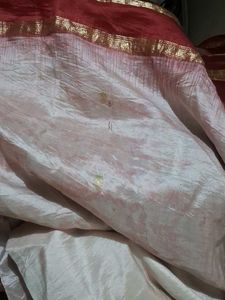 White saree with red border