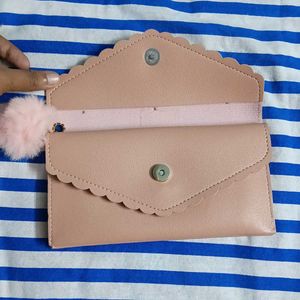 Chic Pink Studded Clutch with Pom Po