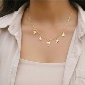 Delicate Gold Flower &amp; Key Necklace