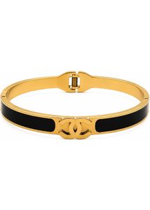 Elegant Gold &amp; Black Bangle Bracelet