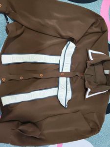 Brown shirt pattern top with bow in front
