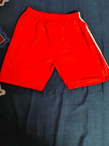RED football and basketball shorts