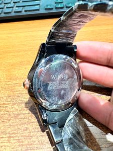 Elegant Black Rolex Watch