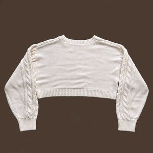 CABLE KNIT CROPPED SWEATER.