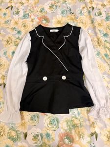 Chic Black & White Peplum Top