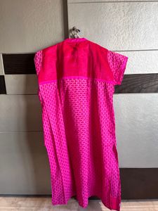 Vibrant Pink Kurti with Floral Accent