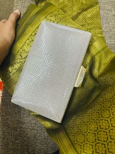 green saree with Clutch Bag