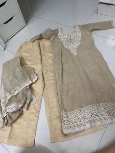 Elegant Beige Kurta Set with Intricate Lace