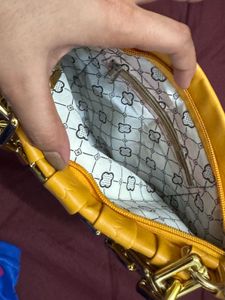 Vibrant Yellow Woven Clutch with Chain Strap