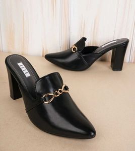 Chic Black Loafers with Gold Accent