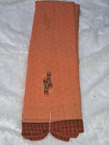 Elegant Orange Saree with Intricate Border without