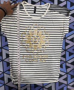 Chic Striped Top with Embellished Flower