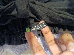 black bandeau top with bow detail and streachable