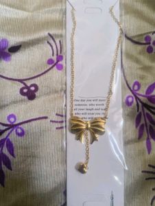 Gold Bow Pendant Necklace