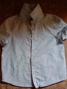 Primark half sleeves printed light blue shirt.. front button closure