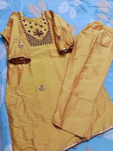 Elegant Yellow Kurta Set with Intricate Embroidery