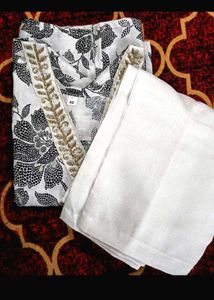 2000 coins Elegant Kurta Set with Intricate Neckli