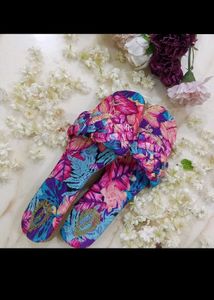 multicolored textured flats