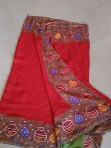 Elegant Red Saree with Unique Border Design