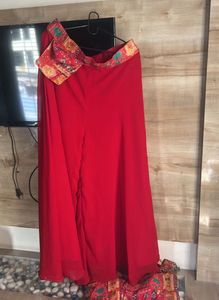 Red plazzo with stone work multi colour top