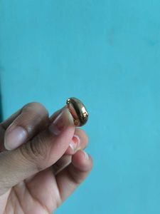 Two anklets and a pair of earings