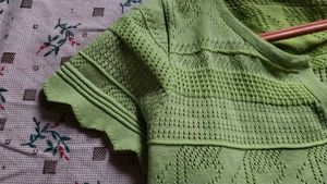 light green knitted button-front crop top