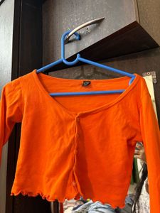 Orange Lettuce Hem Crop Top