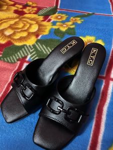 Chic Black Heeled Mules
