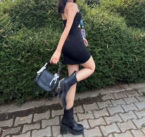 Black Strapless Mini Dress with Bow Detail