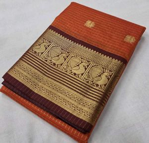 Elegant Orange Saree with Peacock Border