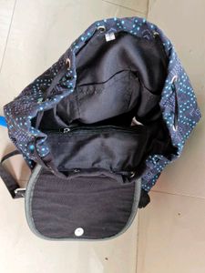 Quilted Backpack with Tassels