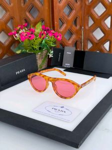 PRADA Sunglasses - Tortoiseshell Frame Pink Lens