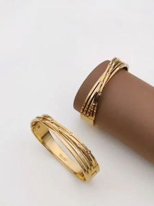 Golden Infinity Twist Bangle (Premium Quality) Siz