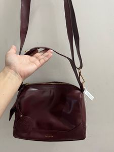 Theatre Burgundy Satchel Bag.