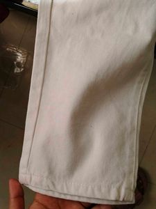 A New White Denim Jeans With Pockets.