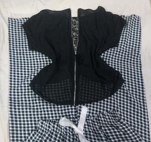 black wip up meesh back top