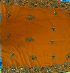 Elegant rust brownish touch saree