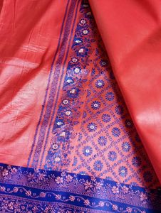 Vibrant pink orange Saree with Blue Border