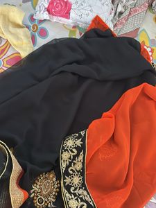 Elegant Orange Saree with Black Border