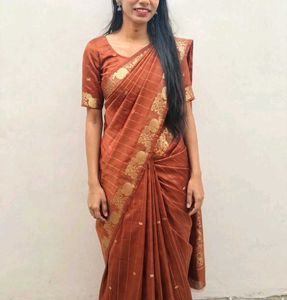 Elegant Rust Orange Saree with Gold Border