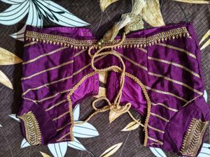 Elegant Purple Saree with Gold Stripes