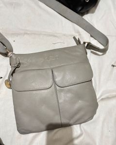 👜 Pure Luxuries London Crossbody Bag – Light Blue