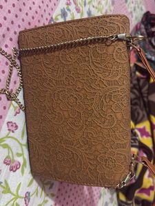 Elegant Embossed Clutch and sling bag