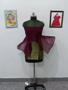 Exquisite Maroon Peplum top with golden mini skirt