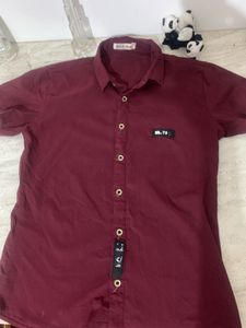 Boys plain maroon half sleeve shirt.